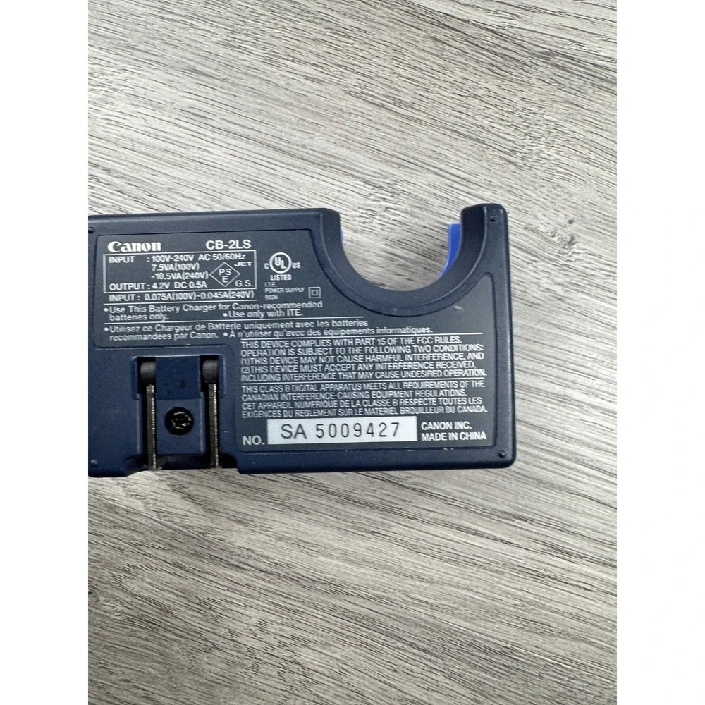 Canon OEM battery charger CB-2LS Power Shot S100 S200 S300 S400 S410 S500 876